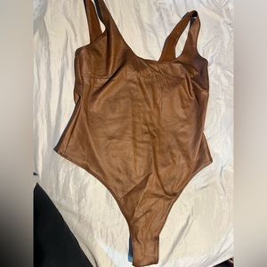 Skims body suit